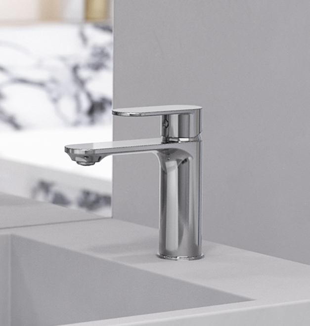 Chromowana bateria łazienkowa TALASSA zamontowana przy umywalce w nowoczesnym wnętrzu.